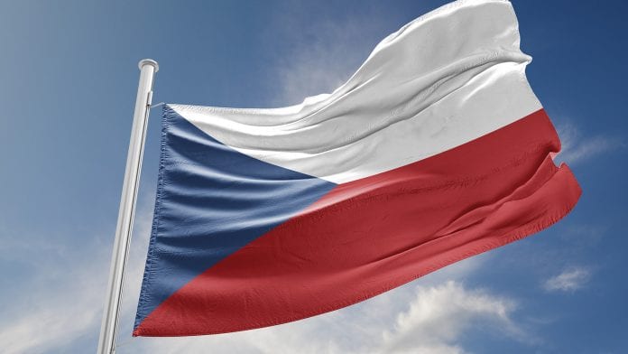 Czech Republic Flag is Waving Against Blue Sky