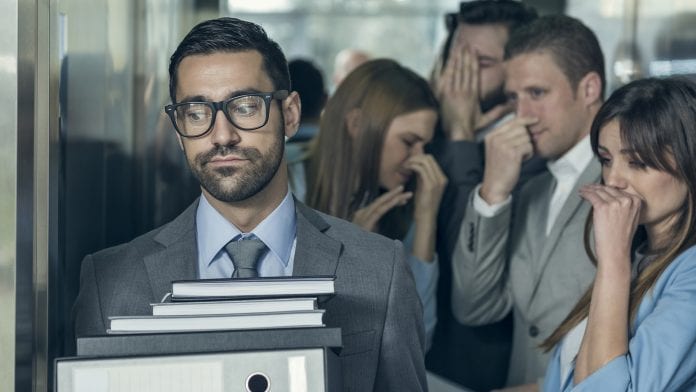 man with bad odour in elevator with people