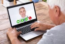 old man on video chat to doctor