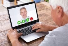 Finland creates digital tools to help seniors stay at home old man on video chat to doctor