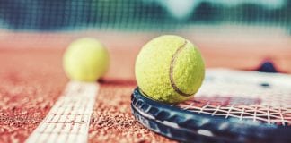 Tennis court, tennis racket and tennis balls
