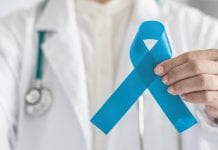 dr holding prostate cancer ribbon