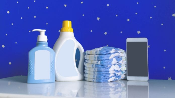 Bottles of cleansers, diapers and a phone in the nursery