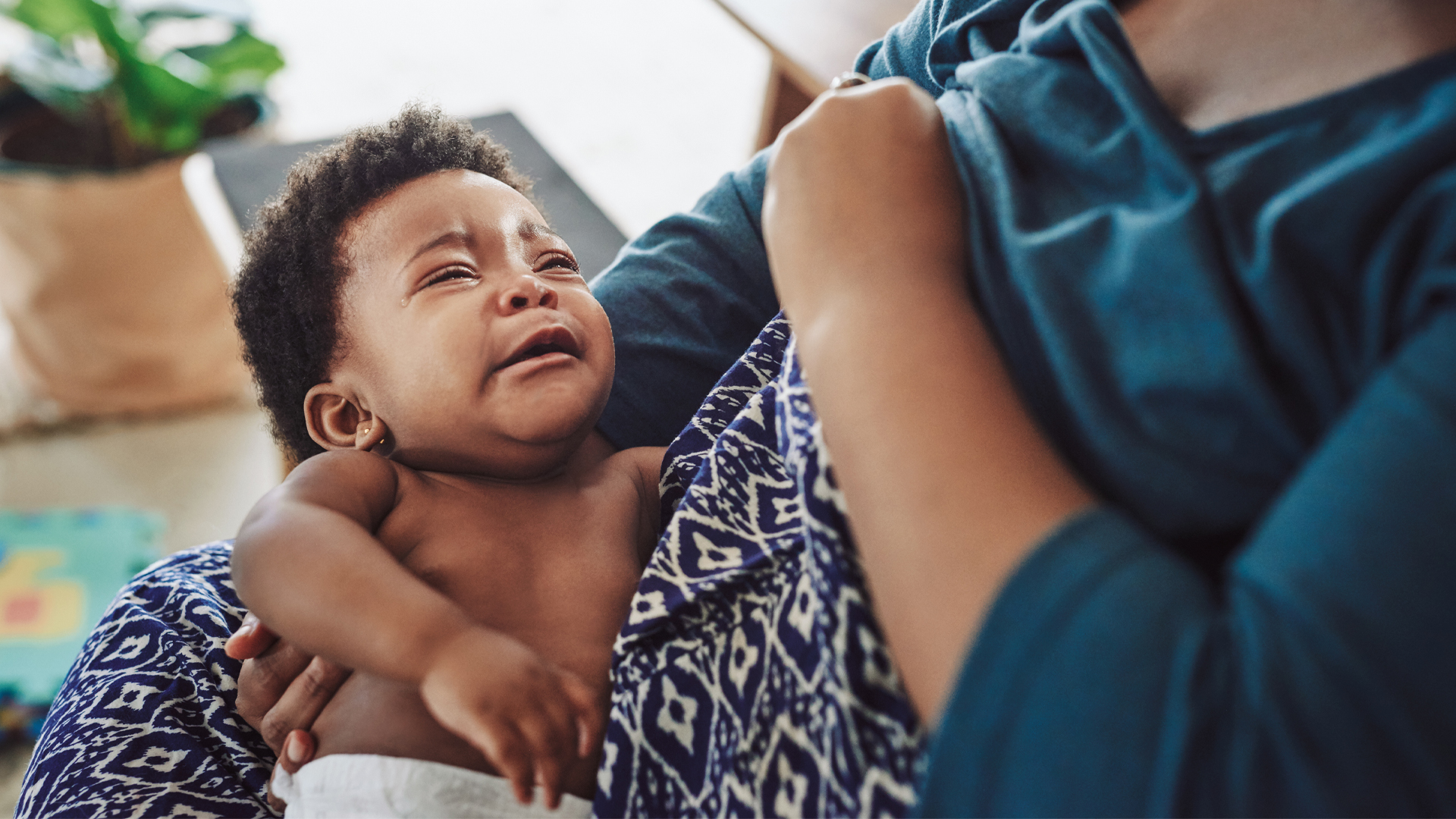 new born baby wanting to be fed