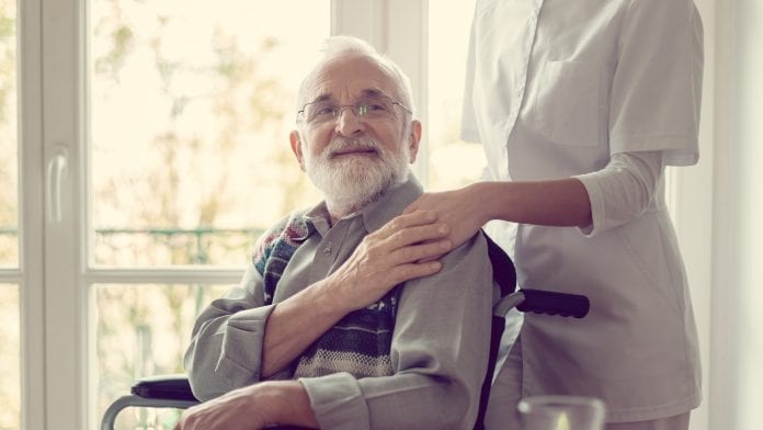 man with Alzheimer's being cared for