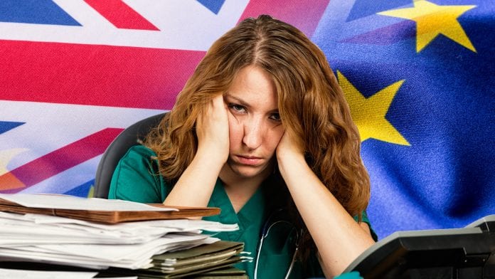 Stressed Out Healthcare Worker with flags of the United Kingdom and the European Union