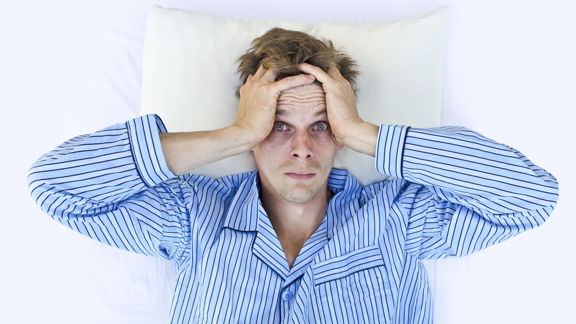 A man not able to get to sleep because of sleep disorder