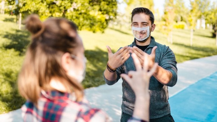 iStock-Kemal Yildirim UK delivers clear face masks to support those with hearing loss