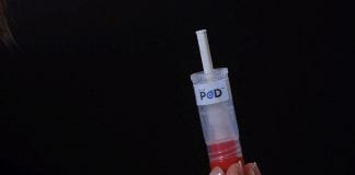 Collecting saliva in a tube to test for COVID-19