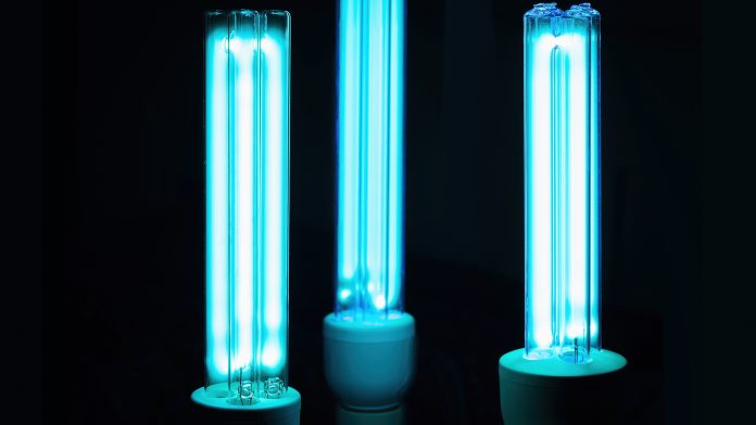 UVC lamp for sterilization - COVID-19 prevention concept UVC