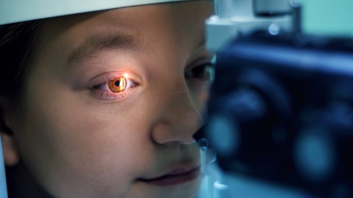 Girl Undergoing Eye Examination glaucoma test