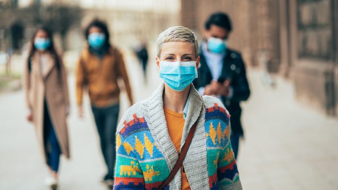 Woman with face protective mask disease outbreaks