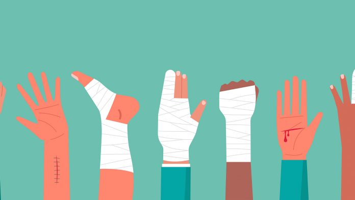Concept of the human hand and foot trauma injury chronic wounds