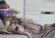 Severe symptoms of COVID-19 reduced by a genetic variant symptoms of COVID-19