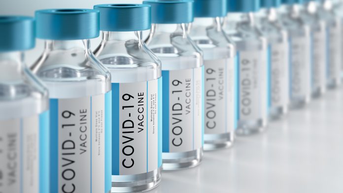 Close-up of bottles of COVID-19 vaccine mixing Covid vaccines