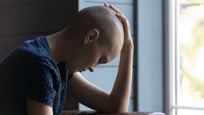 How does psychological distress affect cancer survivors?