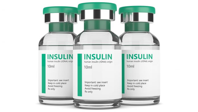 3d rendering of insulin vials over white insulin patch