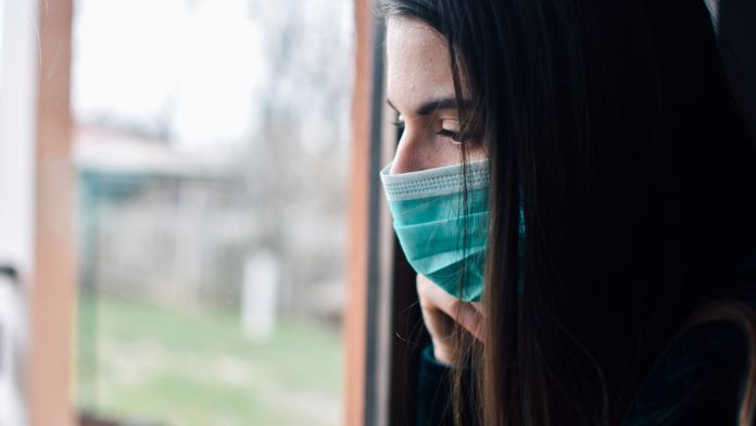 woman in isolation at home mental illnesses