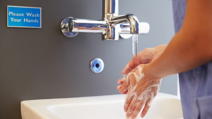 Close Up Of Medical Staff Washing Hands hand hygiene
