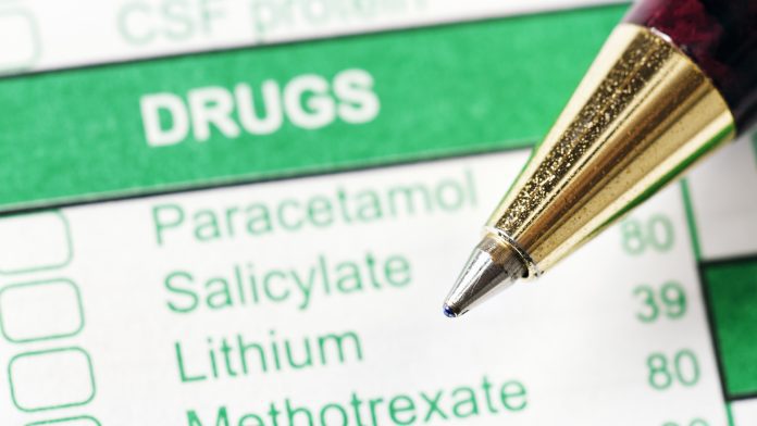 Pen rests on medical form ordering or recording drug usage preventative treatment for dementia