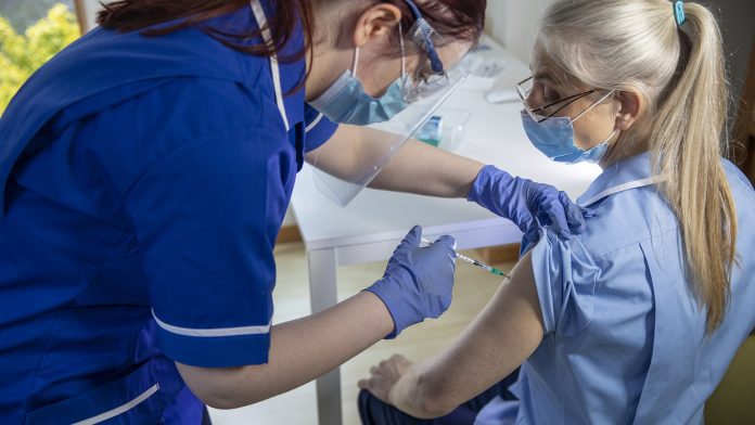 Was the NHS mandatory vaccination policy the answer to boost uptake?