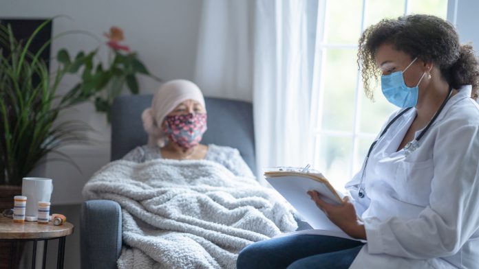© iStock-FatCamera COVID and cancer