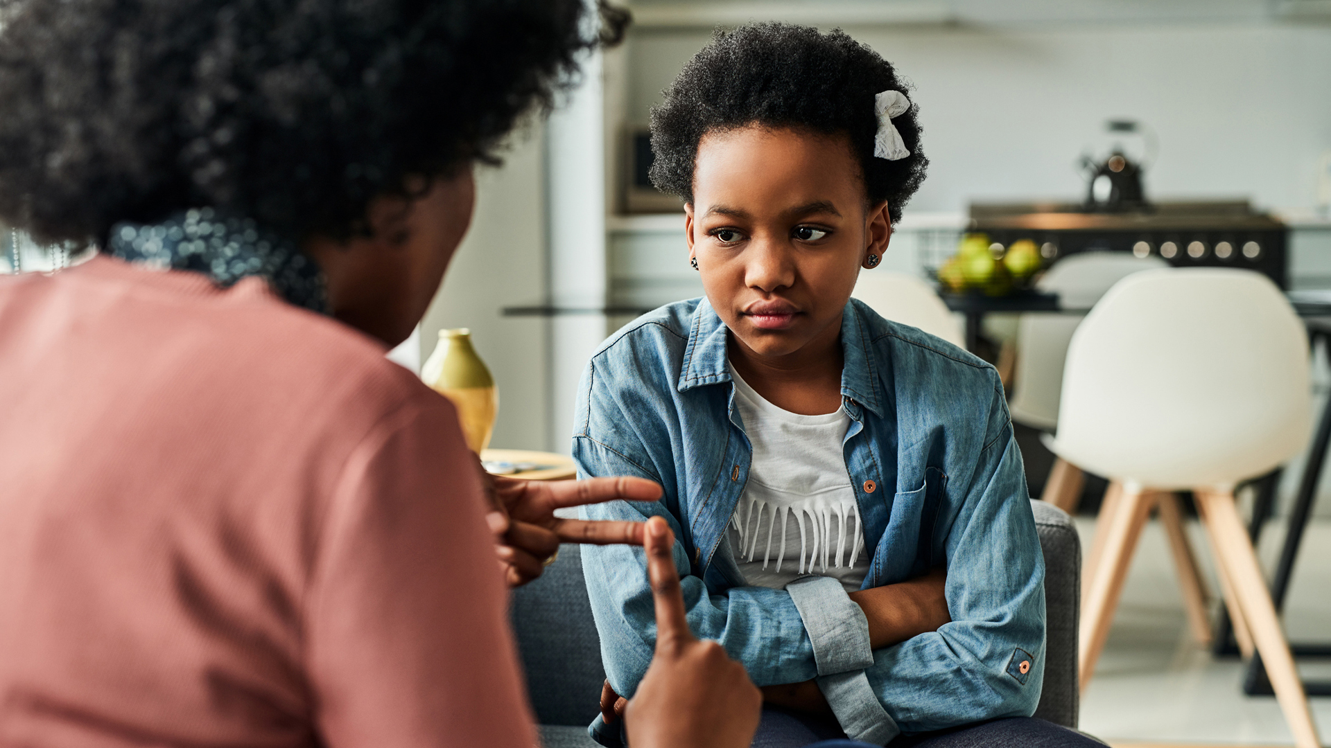 How does external childcare affect behavioural problems in children?