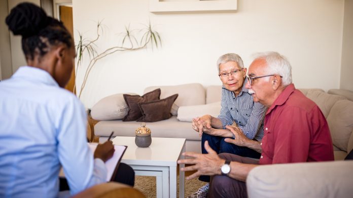 Senior couple home mental health therapy talk therapy
