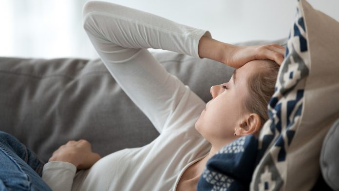 Symptoms of COVID-19 are associated with poor mental health