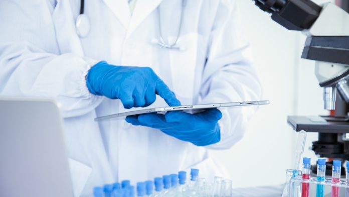 Medical,Or,Scientific,Researcher,Researching,And,Experimenting,Multi-colored,Solution,,Vial AccuTOXTM