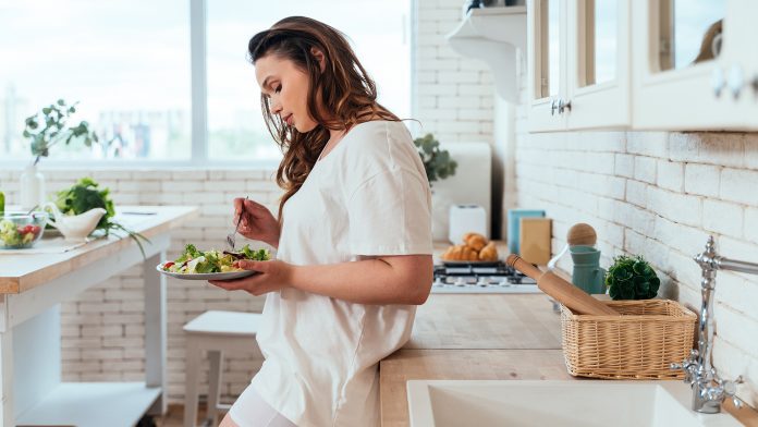 Lifestyle,Moments,Of,A,Young,Woman,At,Home.,Woman,Preparing causes of obesity