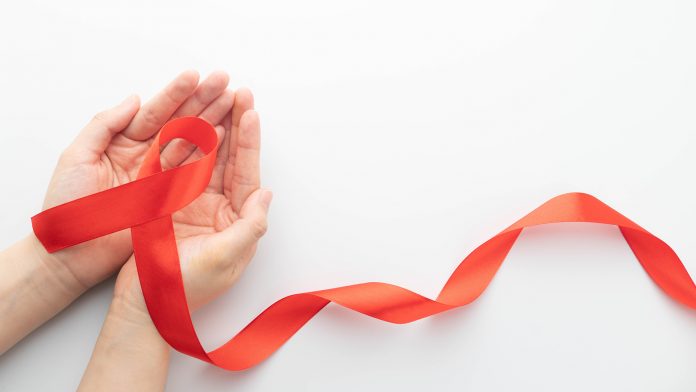 World,Aids,Day,In,December,Month,Campaign.,Human,Hands,Holding HIV awareness