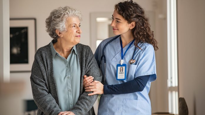 Young,Caregiver,Helping,Senior,Woman,Walking.,Nurse,Assisting,Her,Old nurses